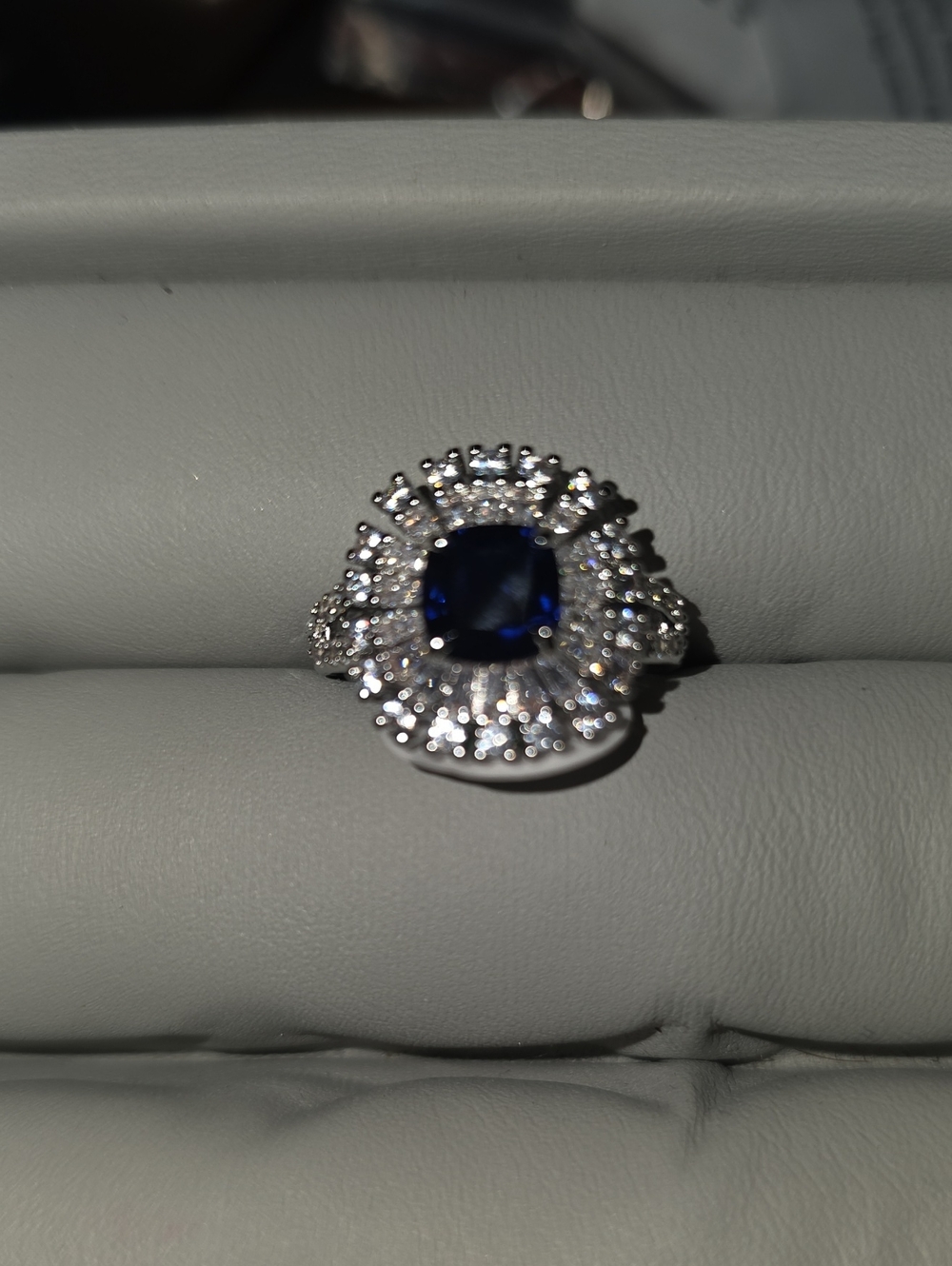 Blue Sapphire Halo Ring with Clear Accents